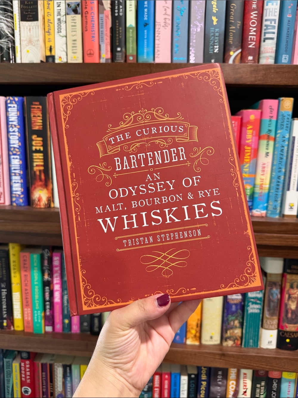 The Curious Bartender: An Odyssey of Whiskies - Red Hardcover